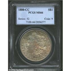 1880-CC S$1 MS66 PCGS. The obverse displays rich moss-green and blue toning with rose undertones, wh