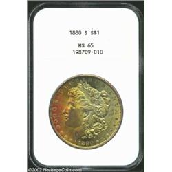 1880-S S$1 MS65 NGC. Medium S mintmark. The obverse has gorgeous yellow-green and peach patina. Lust