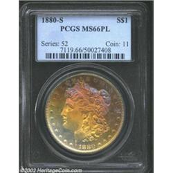 1880-S S$1 MS66 Prooflike PCGS. Regally toned in hues suggestive of ripe lemons and plumbs on the ob