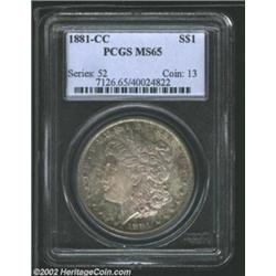 1881-CC S$1 MS65 PCGS. Luxurious violet, sea-green, gold, and ruby-red patina. A lustrous and needle