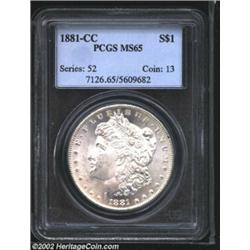 1881-CC S$1 MS65 PCGS. A few faint wisps of tan patina prevent full brilliance. A needle-sharp and s