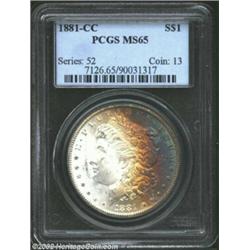 1881-CC S$1 MS65 PCGS. Rich, satiny luster is lightly intruded upon by a smooth rainbow tide of blue