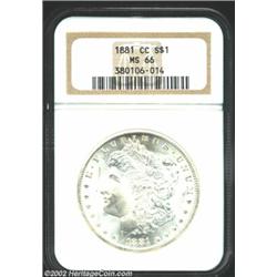 1881-CC S$1 MS66 NGC. Fully struck with bright, creamy luster. Several marks on the cheek serve to l