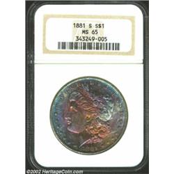 1881-S S$1 MS65 NGC. Magnificently well-colored with all of the intensity of a Louis Comfort Tiffany