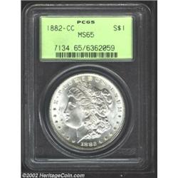 1882-CC S$1 MS65 PCGS. Sharply struck and brilliant with smooth, nearly unblemished surfaces. An exc