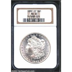 1882-CC S$1 MS65 NGC. A snow-white Gem that has lustrous semi-prooflike surfaces and an immaculately