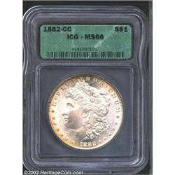 1882-CC S$1 MS66 ICG. A well struck and flashy Gem that has blushes of lemon-gold patina at the bord