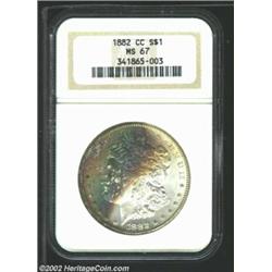 1882-CC S$1 MS67 NGC. Seldom do we offer an 1882-CC Morgan Dollar with surfaces that are as smooth a