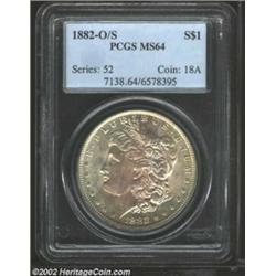 1882-O/S S$1 MS64 PCGS. A sharply struck and carefully preserved near-Gem, this specimen displays a.