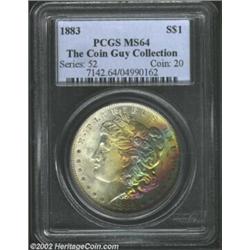 1883 S$1 MS64 PCGS. An average coin with absolutely exceptional obverse toning. Pastel shades of vio