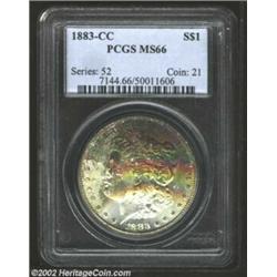 1883-CC S$1 MS66 PCGS. The obverse displays original bag toning in maroon, green, and blue shades. T