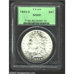 1883-O S$1 MS66 PCGS. Both sides of this beautiful Gem are snow-white and flashy, with a pleasing mi