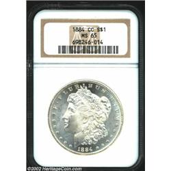 1884-CC S$1 MS65 NGC. Strong contrast between Liberty and the fields with a good deal of reflectivit