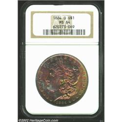 1884-O S$1 MS64 NGC. The mintmark is lightly repunched within the loop. The obverse has vivid rose-v