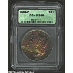 1884-O S$1 MS66 ICG. Deeply toned in rich plum, blue, and canary shades on the obverse while the rev