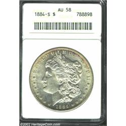 1884-S S$1 AU58 ANACS. While the surfaces are lightly abraded from brief wear, the details remain sh