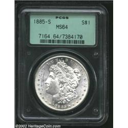 1885-S S$1 MS64 PCGS. A flashy near-Gem that has a crisp strike and brilliant surfaces. The cheek is