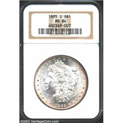 1885-S S$1 MS64 NGC. The surfaces are highly lustrous, as one would expect from this issue, and ther