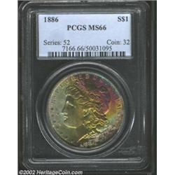 1886 S$1 MS66 PCGS. Spectacular rainbow toning covers the obverse of this immaculate Morgan Dollar..