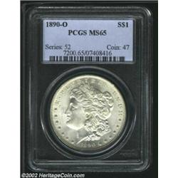 1890-O S$1 MS65 PCGS. Boldly struck for the issue, with surprising sharpness in the centers, claws,.