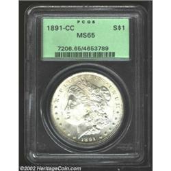 1891-CC S$1 MS65 PCGS. Full, shimmering mint luster swirls around both sides with a richly frosted t