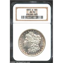 1892-S S$1 AU58 NGC. The boldly struck surfaces are almost completely lustrous and show only a few l