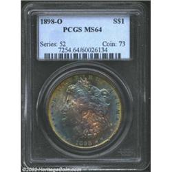 1898-O S$1 MS64 PCGS. Outrageously toned in luxurious variants of blue and garnet with a ring of ric