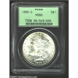 1899-O S$1 MS66 PCGS. A bright white, sharply struck Gem with semi-prooflike fields, mixing frosty c