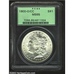 1900-O/CC S$1 MS65 PCGS. The sharply struck surfaces of this brilliant Gem have a pleasing, satiny t