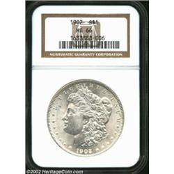 1902 S$1 MS66 NGC. A lustrous and brilliant Gem that has seemingly pristine fields. Minor weakness o