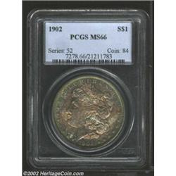 1902 S$1 MS66 PCGS. The toning present on both sides of this Gem is a mixture of golden-crimson and.