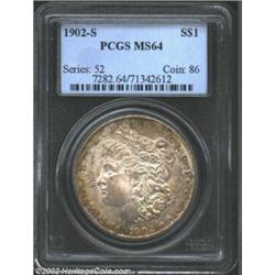 1902-S S$1 MS64 PCGS. Originally toned in grey with rainbow accents on the obverse. The reverse is m