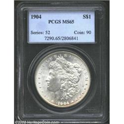 1904 S$1 MS65 PCGS. This lustrous Gem is noticeably free of any distracting abrasions, especially on