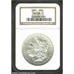 1904 S$1 MS65 NGC. This brilliant Gem is lustrous and well struck, and has hints of reflectivity in.