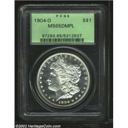 1904-O S$1 MS65 Deep Mirror Prooflike PCGS. A flashy brilliant Gem with deeply reflective fields and