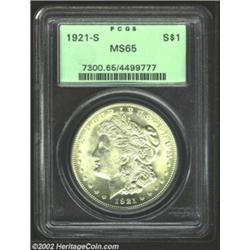 1921-S S$1 MS65 PCGS. Beautiful pale original tone and gleaming satiny luster are the hallmarks of t