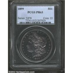 1899 S$1 PR63 PCGS. Easily identifiable as a proof, with deep mirrors and a razor-sharp strike. Unfo