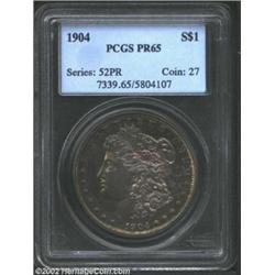 1904 S$1 PR65 PCGS. Deeply toned on each side in shades of steel-gray, golden-brown and russet, this