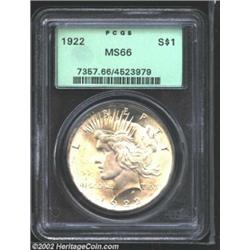 1922 S$1 MS66 PCGS. Pastel gold and steel-blue patina. A lustrous first-year Gem that has exquisite.