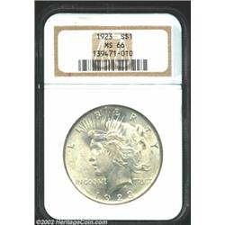 1923 S$1 MS66 NGC. A superb, high grade example, with lots of luster, and partially toned milky-whit