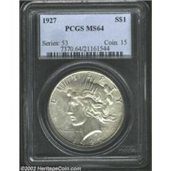 1927 S$1 MS64 PCGS. The luster is rather subdued under light tan toning and the surfaces are free of