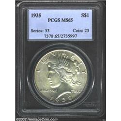 1935 S$1 MS65 PCGS. The obverse displays the slightest tinge of golden color while freckles of olive