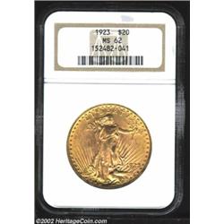 1923 $20 MS62 NGC. Frosty and moderately abraded beneath rich reddish-gold patina. Important notice: