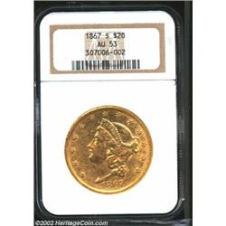 1867-S $20 AU53 NGC. Hints of red in the protected areas and the fields are olive-gold on this light