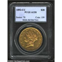 1892-CC $20 AU50 PCGS. Light wear can be seen on the crown and lettering of Liberty, and along the r