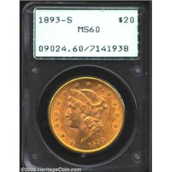 1893-S $20 MS60 PCGS. Evenly distributed, orange tinged color is probably the most impressive featur