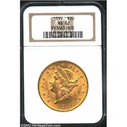 1899 $20 MS62 NGC. A frosty Uncirculated example with appealing two-toned golden color.From the Aaro