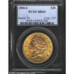 1900-S $20 MS63 PCGS. This reddish-gold example is ringed in olive-gold color that hugs the denticle