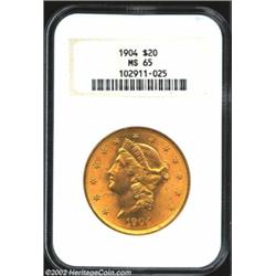 1904 $20 MS65 NGC. A lustrous and beautifully preserved Gem that has a virtually pristine reverse. W