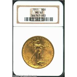 1911 $20 MS62 NGC. Lustrous with clean surfaces for the grade. A nicely struck yellow-gold example..